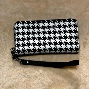 Multiple Michael Kors bags and wallets